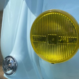 Faro aggiuntivo universale giallo per scudo Vespa e LML con omologazione E3